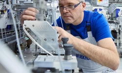 man-working-on-machine